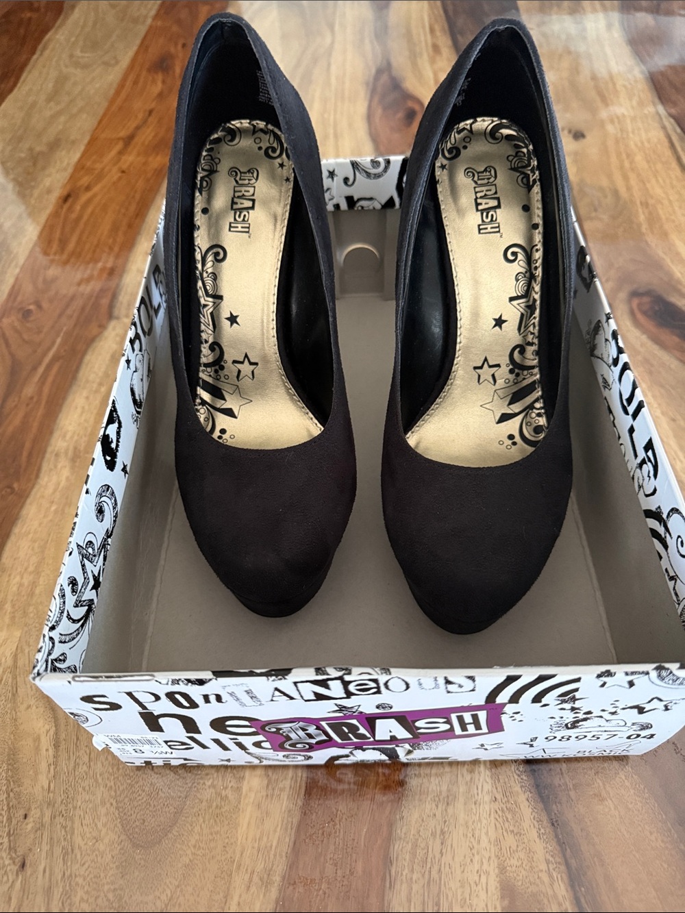 Brash Black Suede Round-Toe Heels.